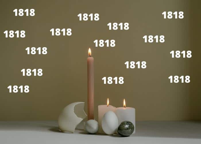 Candles burning with eggs and the number 1818 all around it.